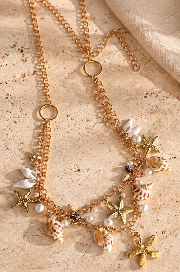 Shoreline Charm Necklace on travertine