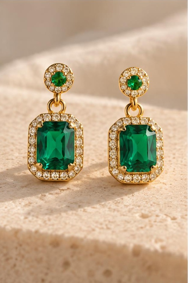 Emerald Halo Earrings on travertine