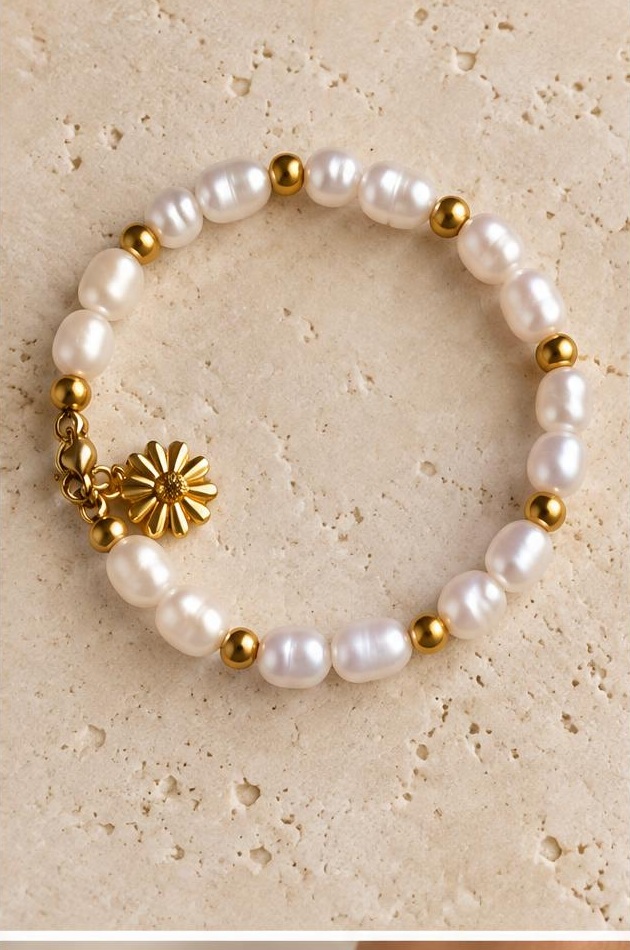Pearl-like Flower Charm Bracelet on travertine