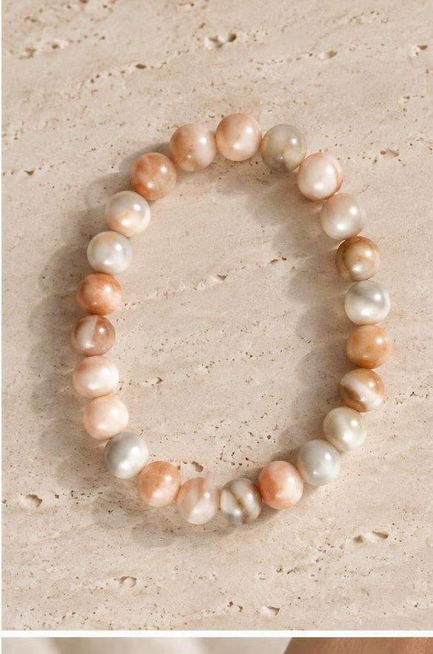 Peach & White Bead Bracelet on travertine