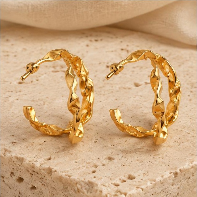 Braided Gold-tone Hoops on travertine