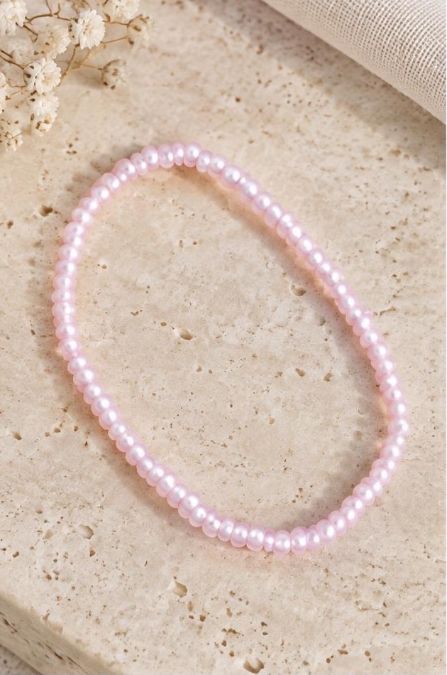 Blush Seed Bead Bracelet on travertine