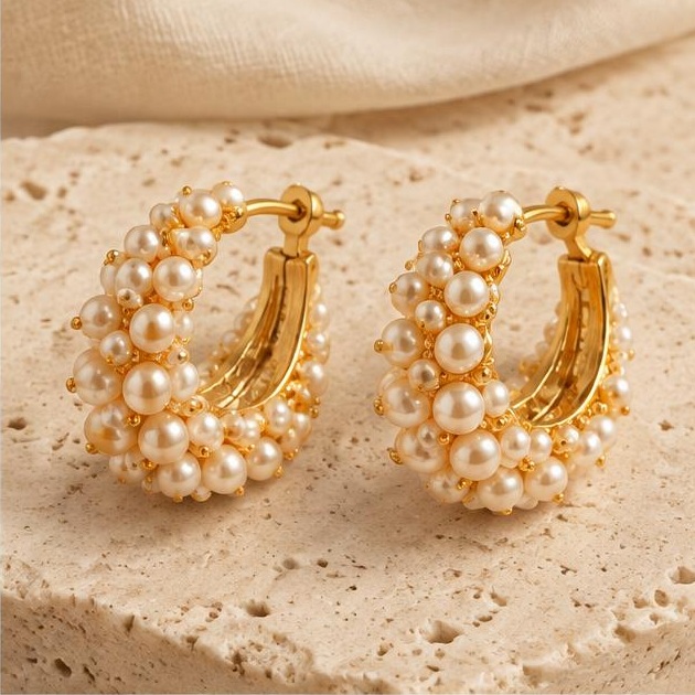 Pearl-textured Hoops on travertine