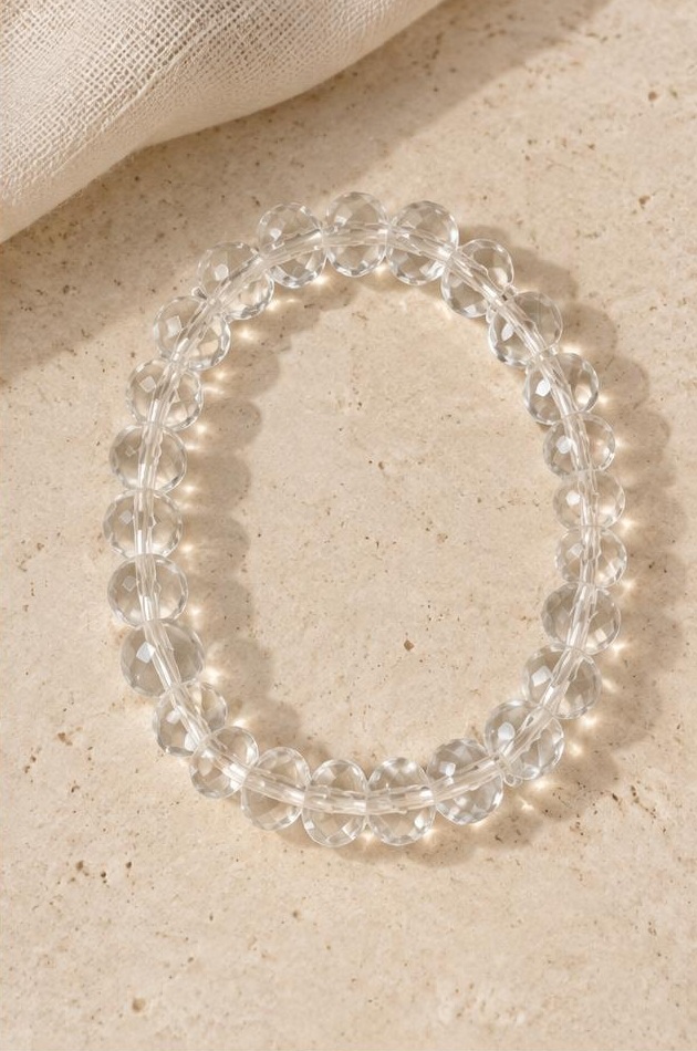 Clear Bead Bracelet on travertine